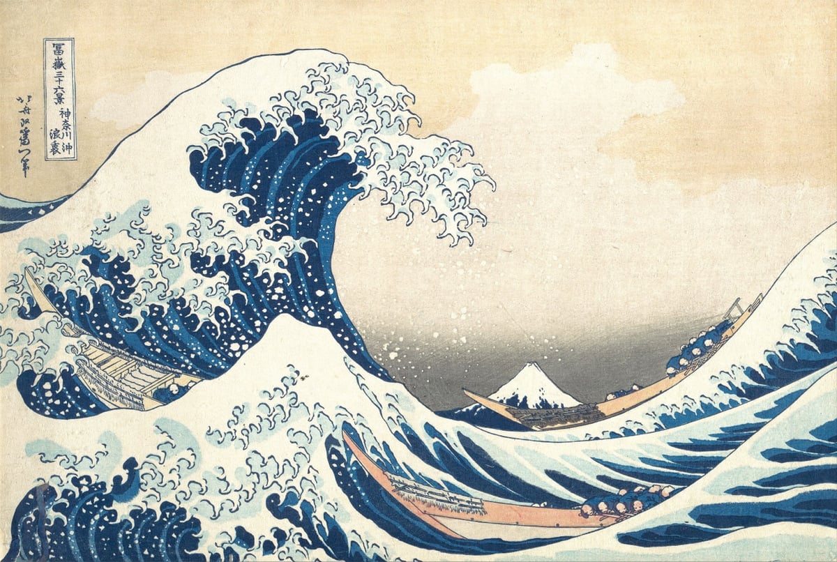 a woodblock print of a wave by Hokusai