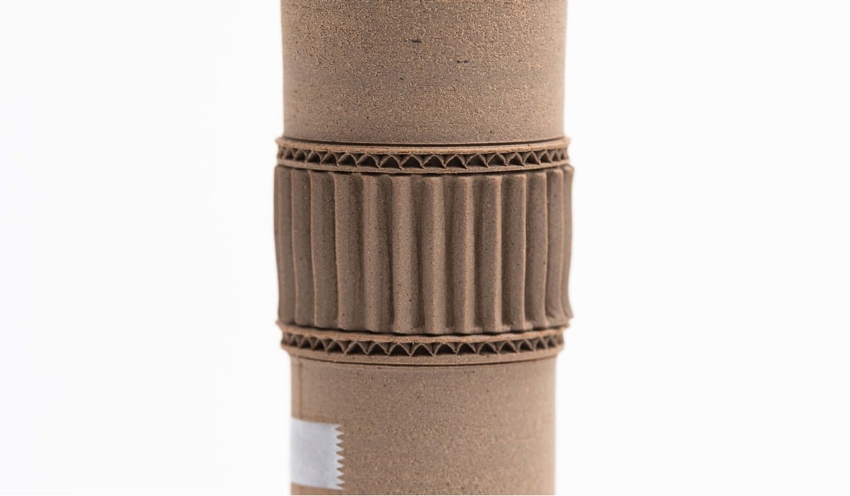 ceramic vase that looks like it's made out of cardboard