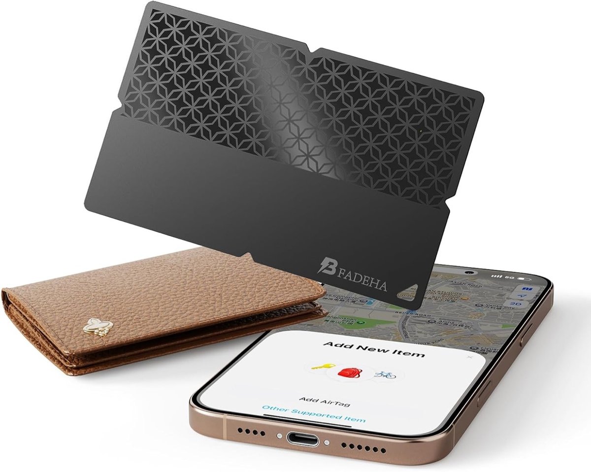 a tracker device the size and shape of a credit card, pictured with a phone and a wallet
