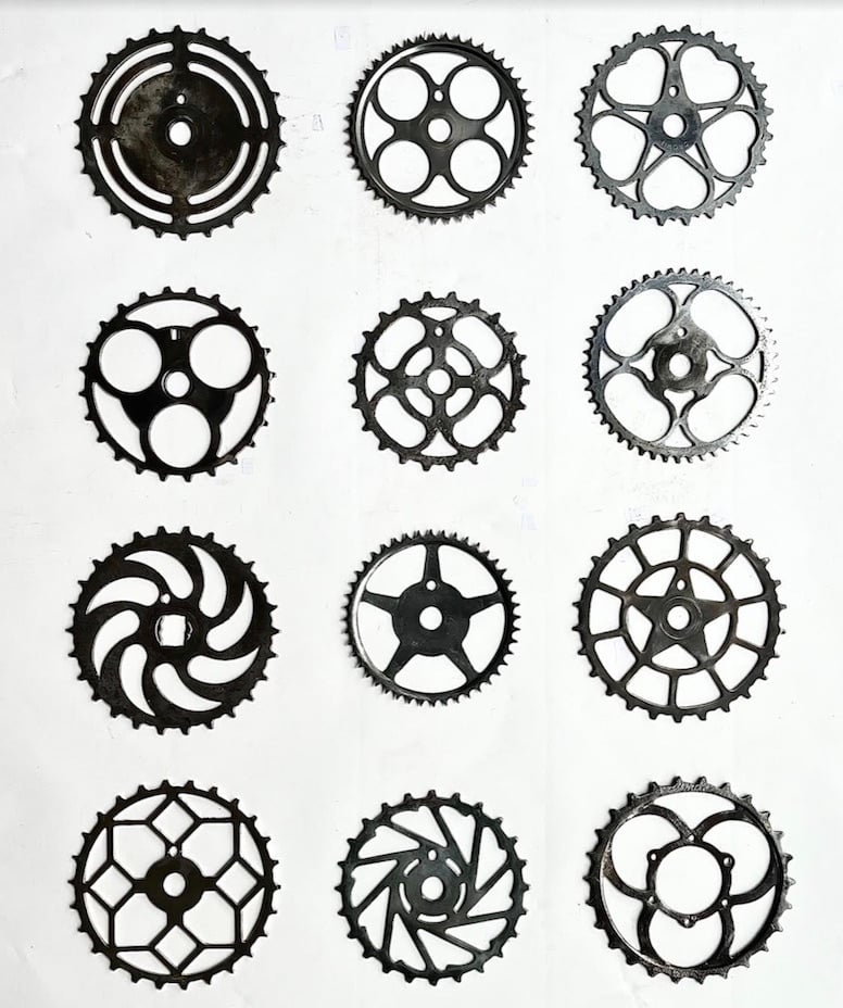 a collection of vintage bike gears