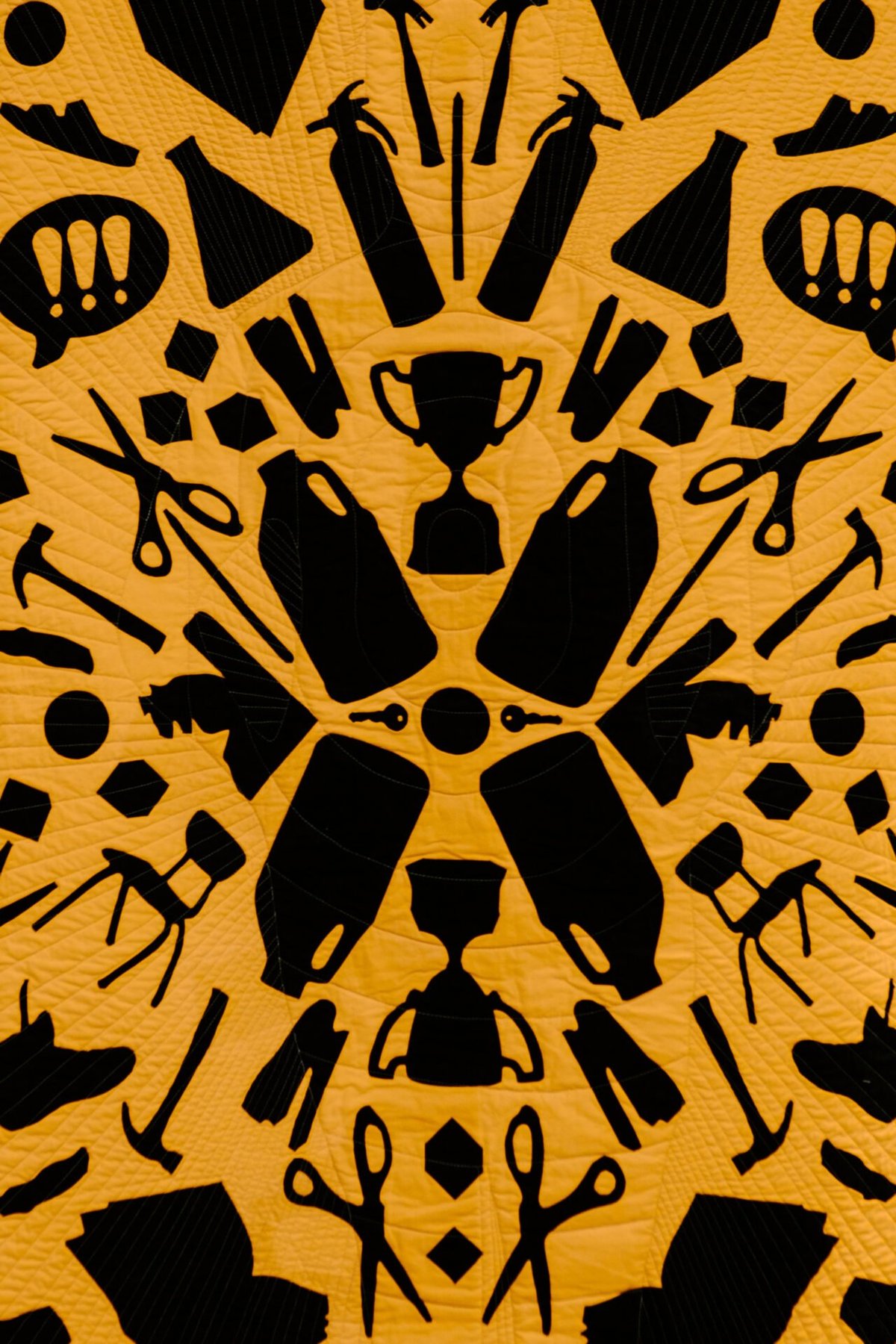 quilt called What We Will Use as Weapons: A List of School Supplies