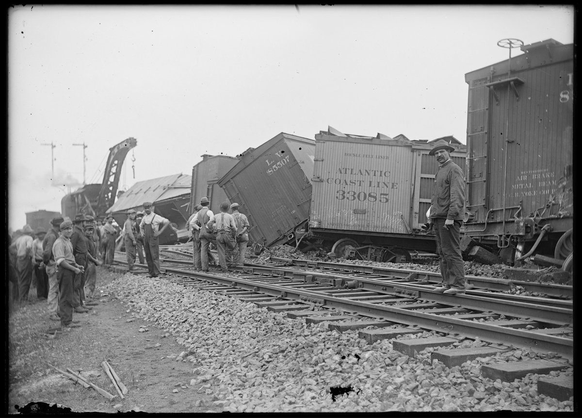 black and white photo of a train wreck