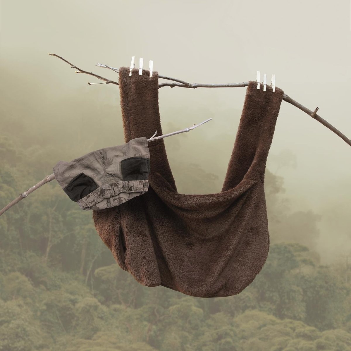 clothes hanging on a clothesline that looks like a sloth