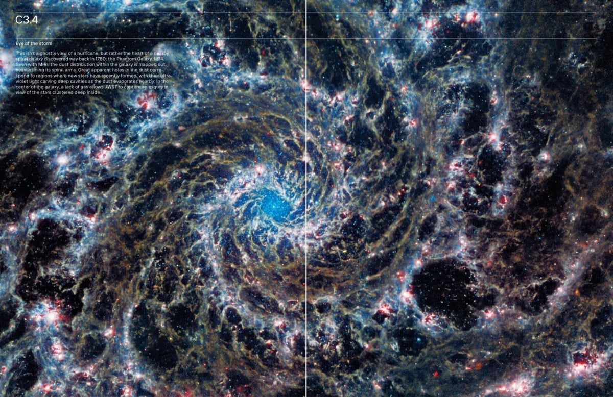 page spread of Infinite Cosmos showing the swirling Phantom Galaxy