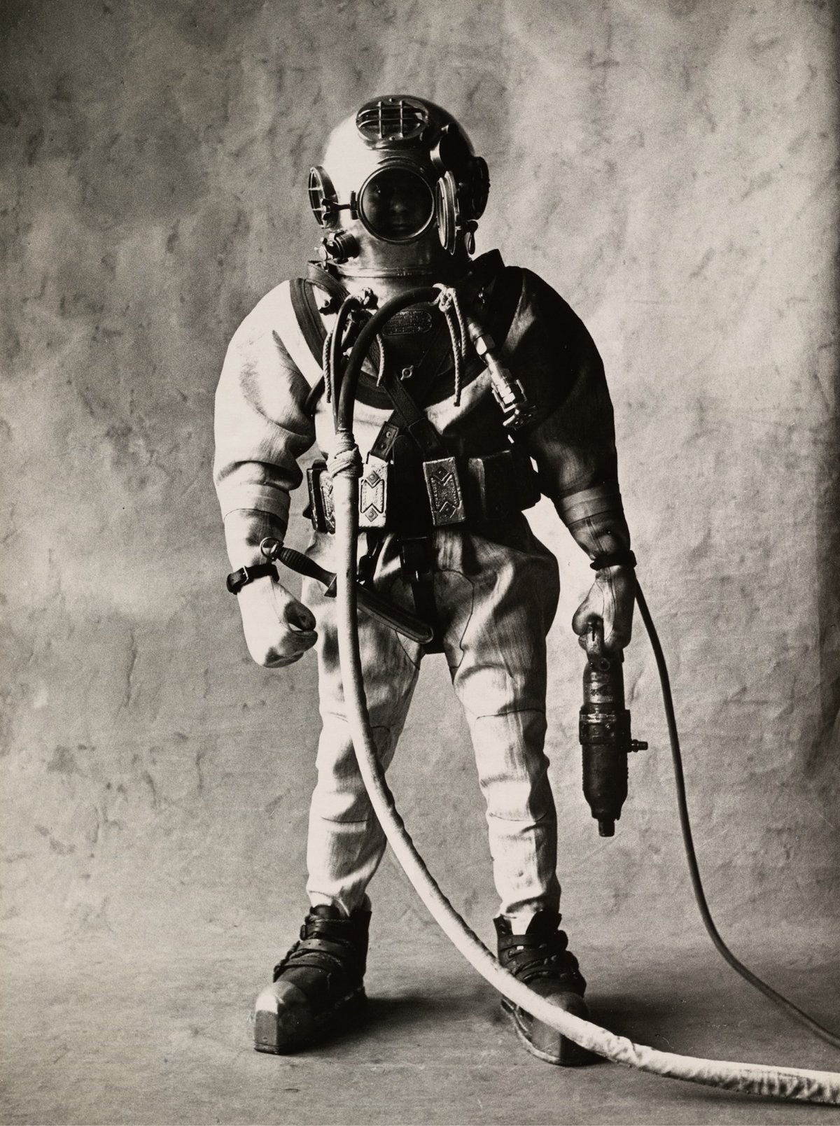 black & white photo of a deep sea diver posing