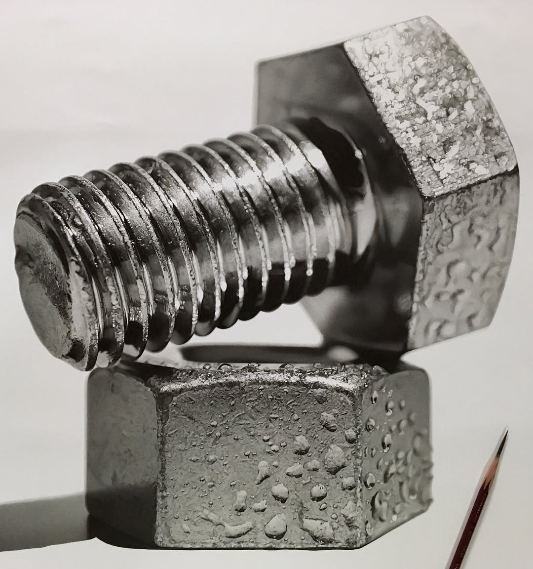 hyperrealistic pencil drawing of a bolt sitting on top of a nut