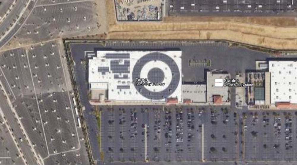 satellite image of a Target store with a Target logo on the roof