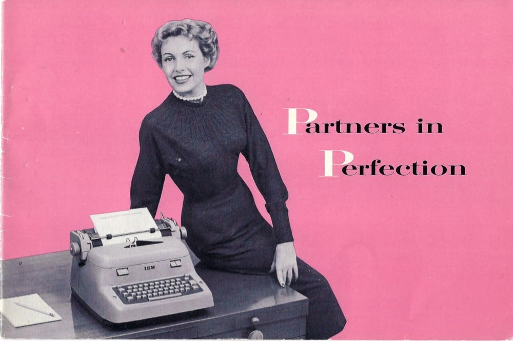 manual for an IBM typewriter featuring a woman sitting on the corncer of a desk with a typewriter on it