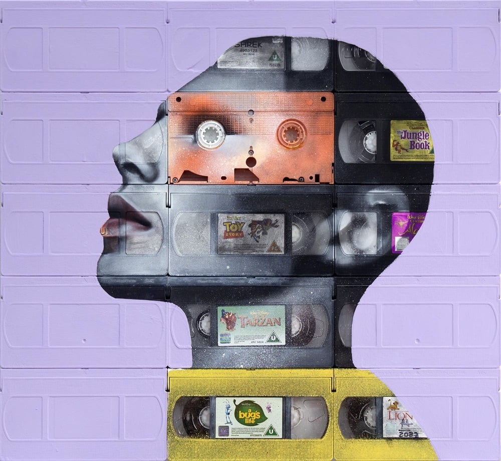 portrait of a person's head made out of cassette tapes and VHS tapes