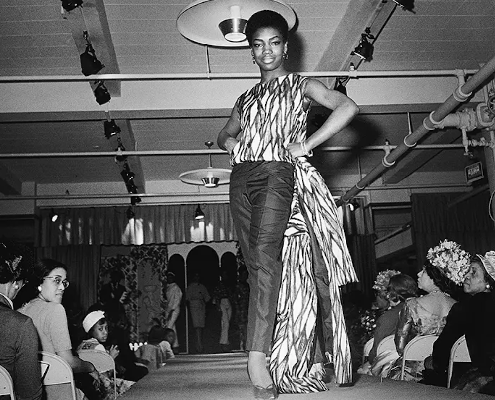 nomsa-brath-modeling-congolese-fabrics-sterns-department-store-1963-kwame-brathwaite-photo.png