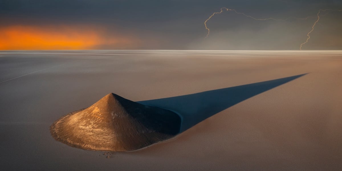 a triangular hill leaves a long shadow