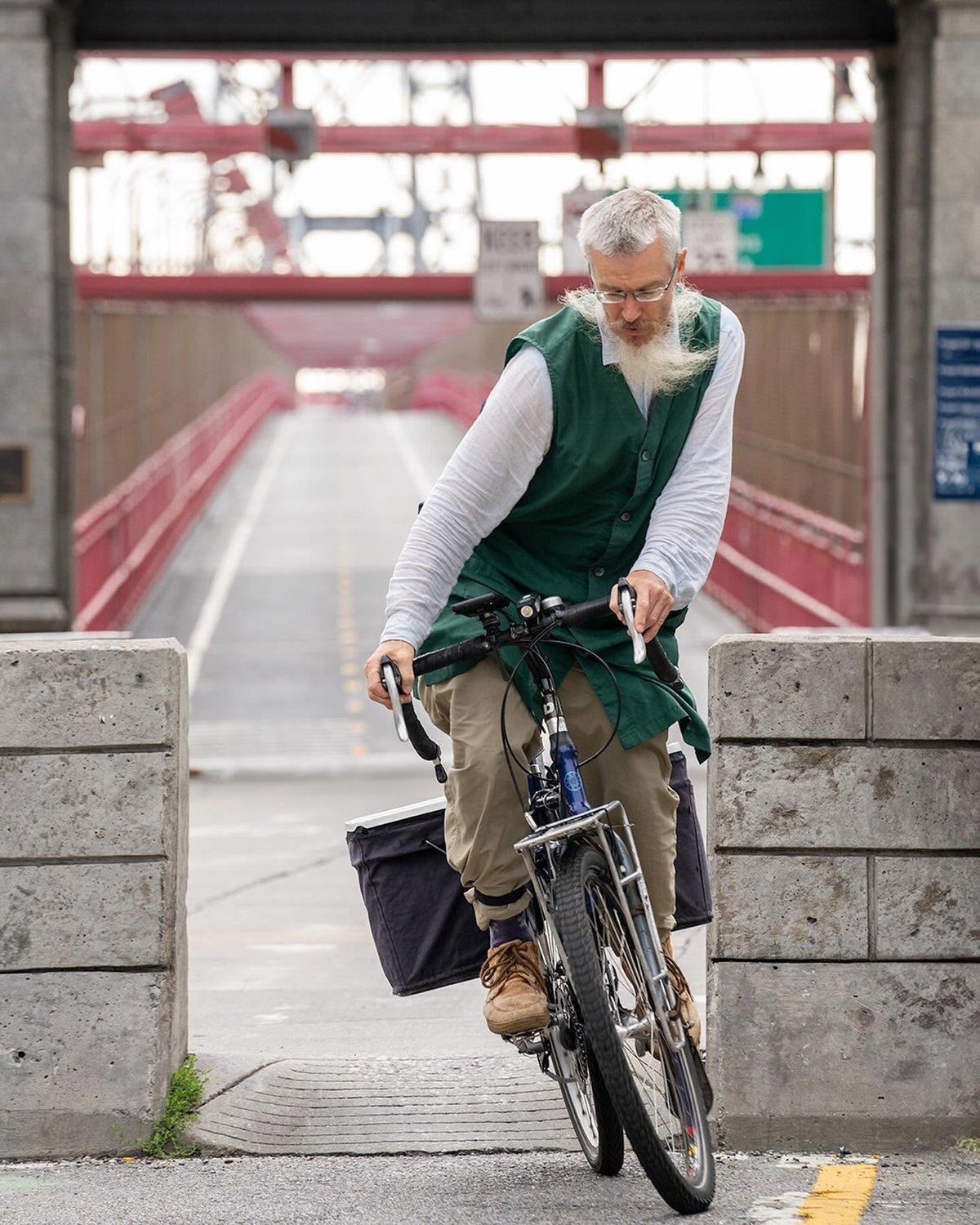 a biker exiting the Williamsburg Bridge bike path