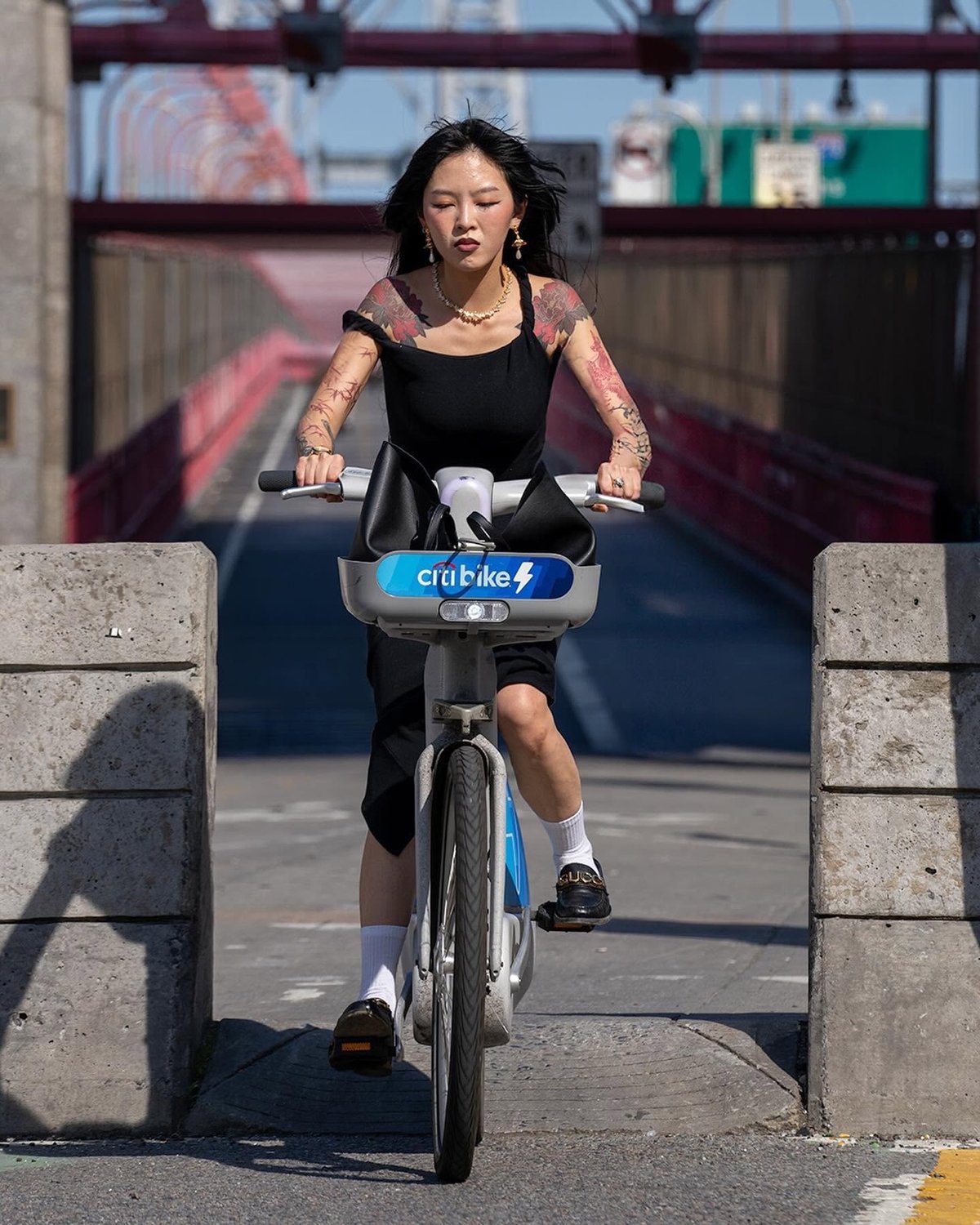 a biker exiting the Williamsburg Bridge bike path