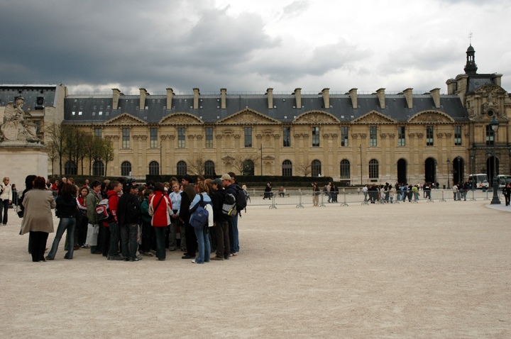 A storm and tour group gathers