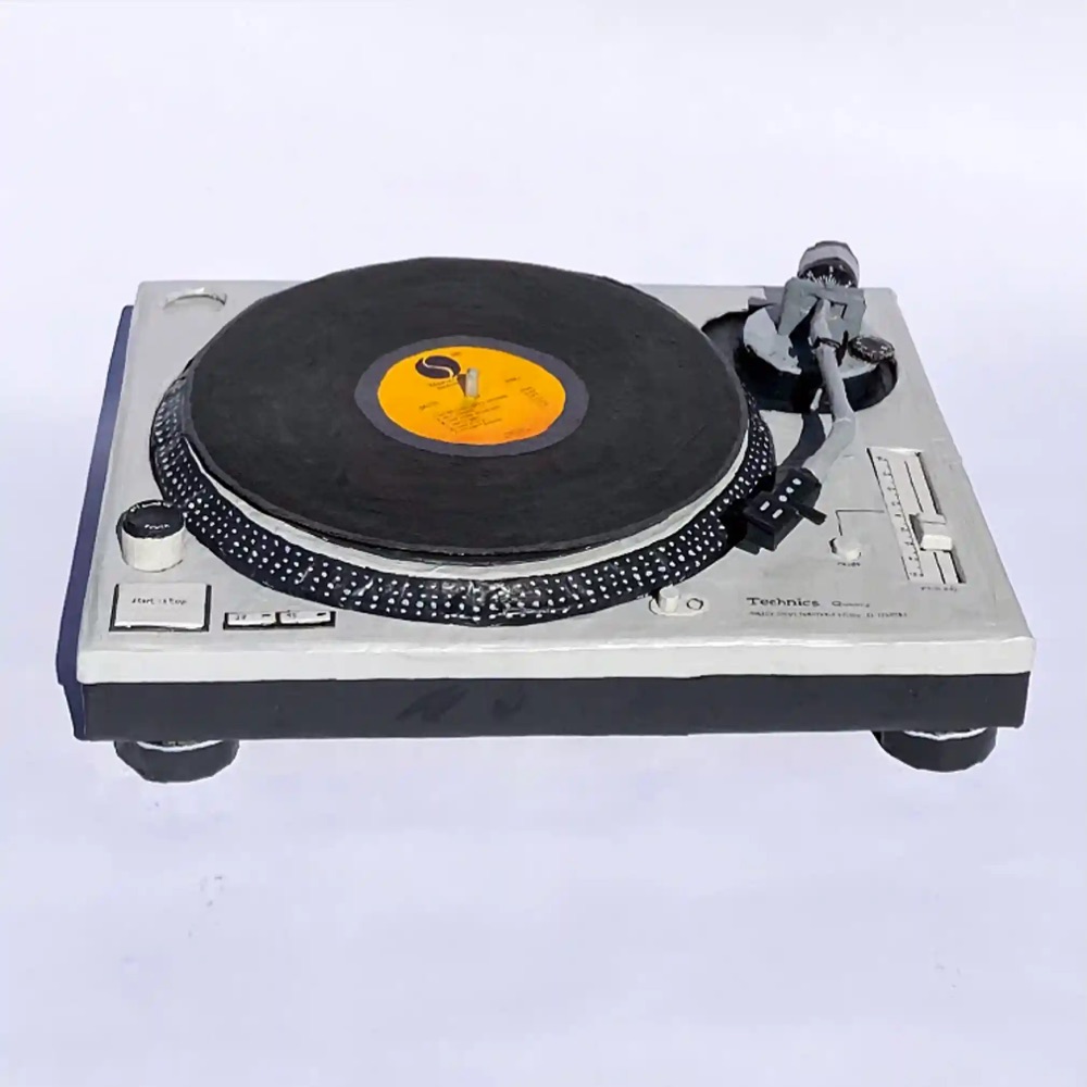 a record player made from paper mâché