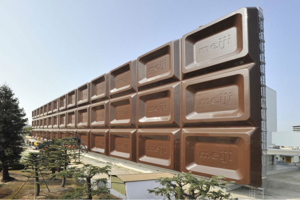 a chocolate factory with a facade that looks like a big chocolate bar
