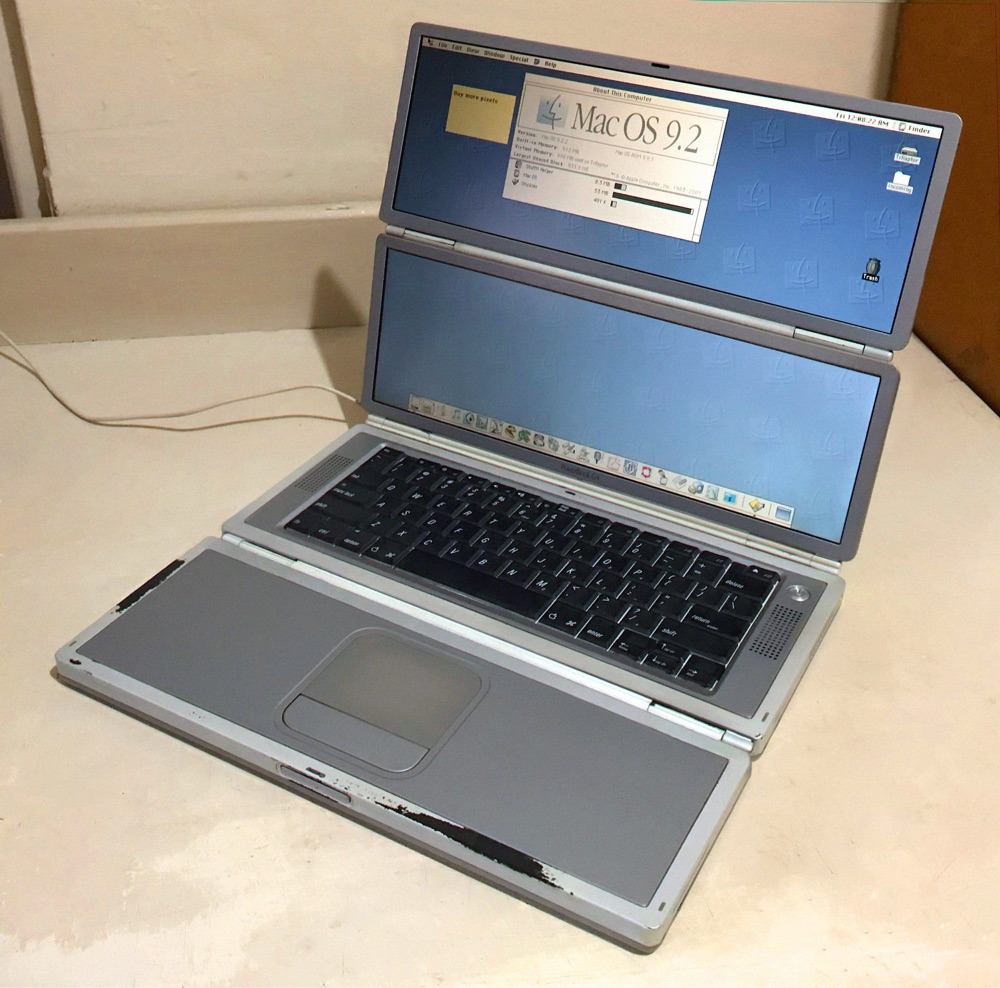 a mockup of a Powerbook G4 that folds into quarters