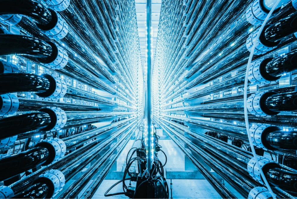 a room full of high-tech blue tubes