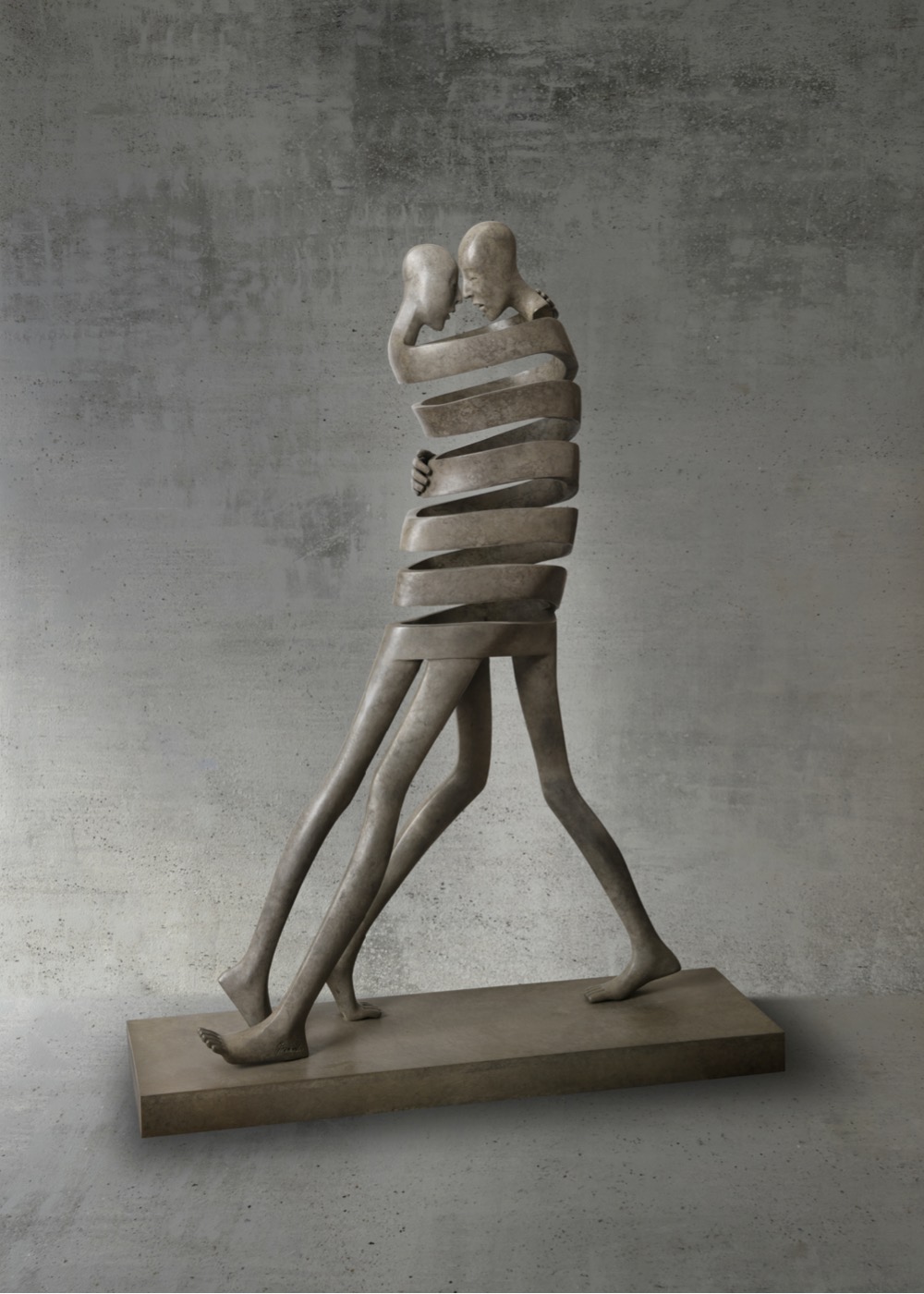 sculpture of two people intertwined in an embrace