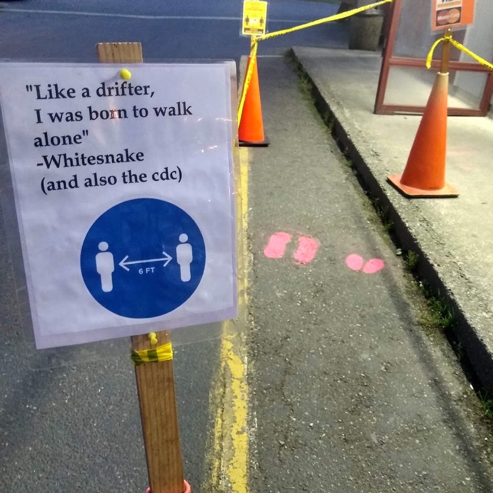 Local social distance signs: I was born to walk alone