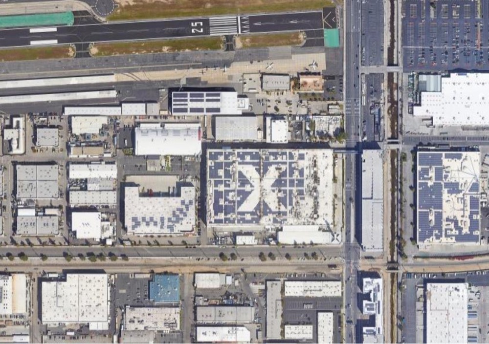 satellite image of SpaceX headquarters with an X on the roof