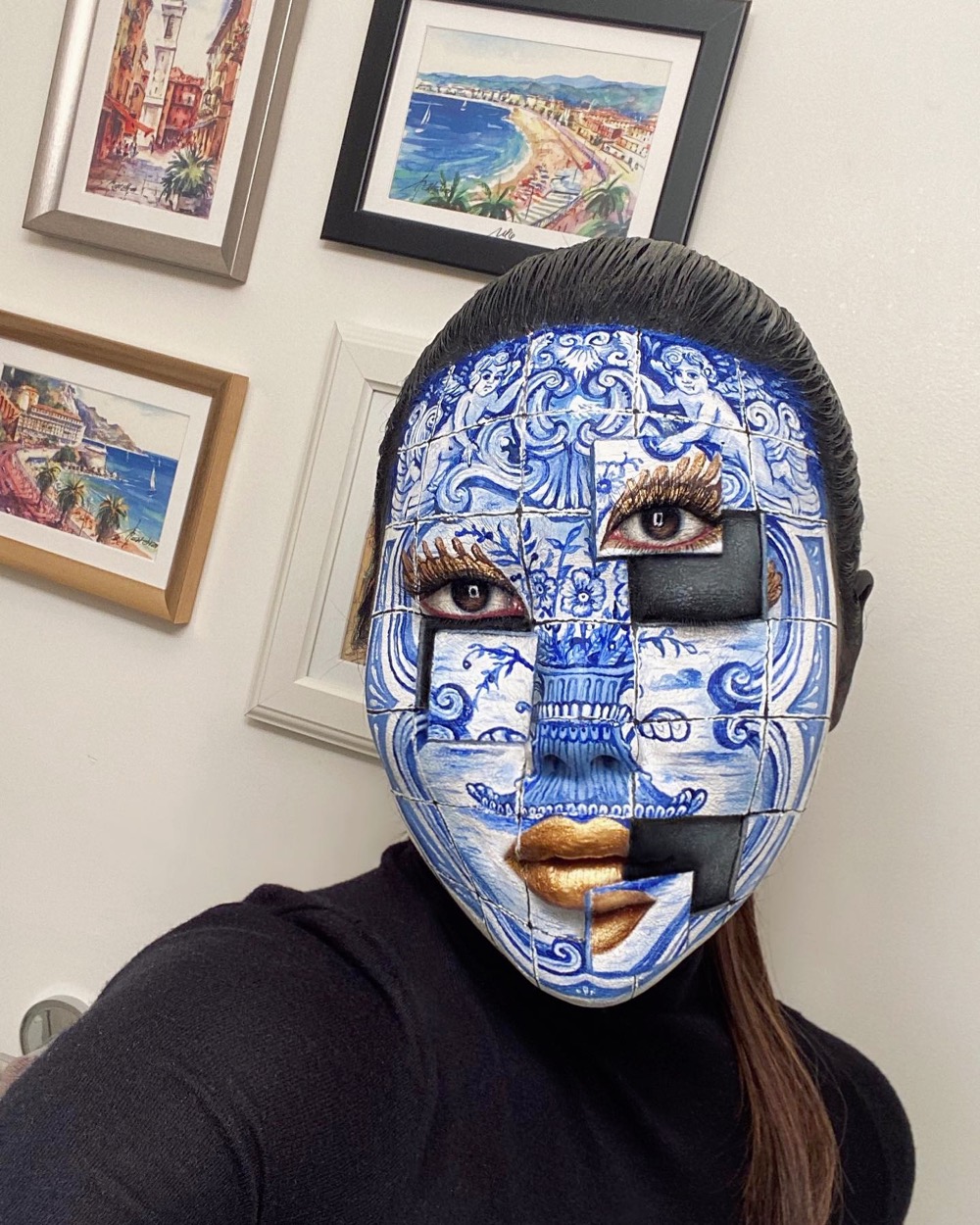 elaborate face makeup that makes it look like a woman's face is made of blocks
