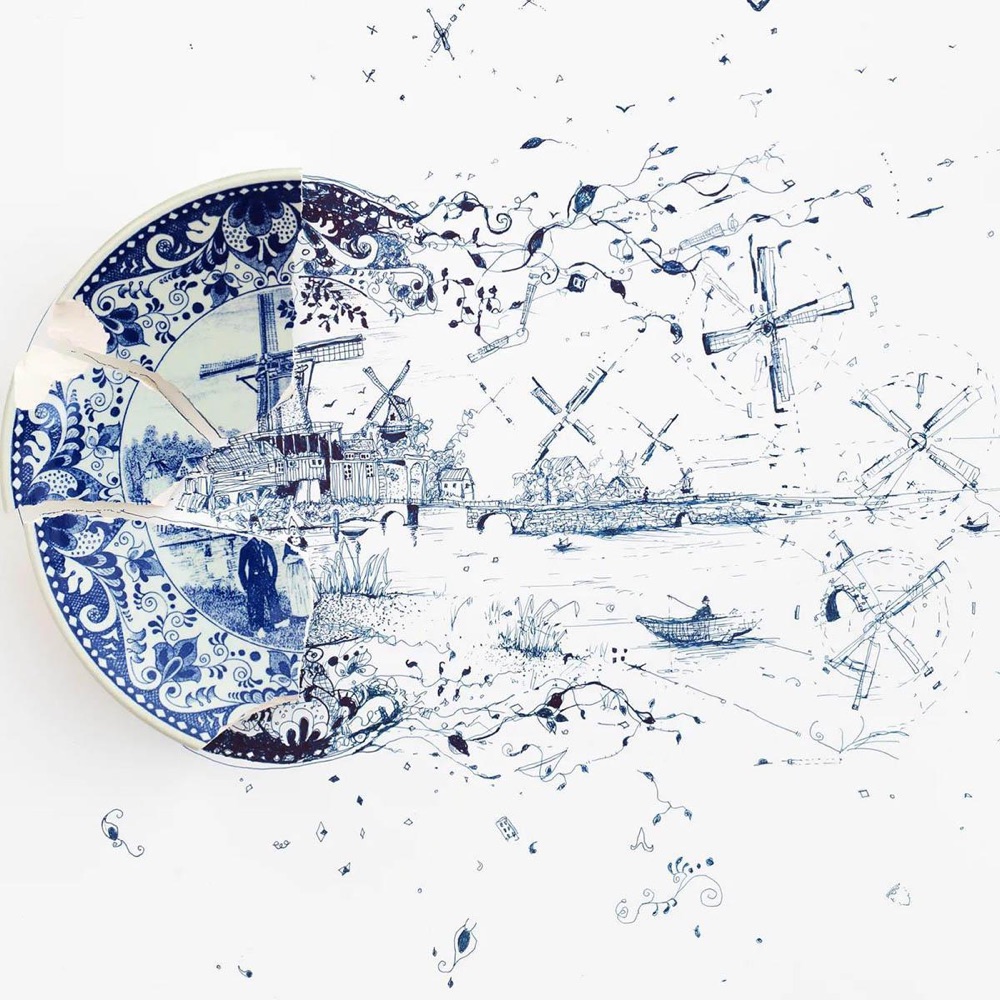 the ornate images on a broken plate continue onto a sheet of paper